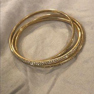 Gold tone metal and CZ bangles